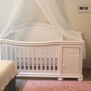 White crib with changer